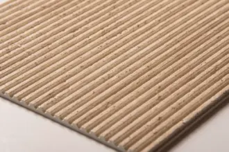 Artstone | Halycon Travertine mineral-based decorative wall panel in light beige with a fine linear texture