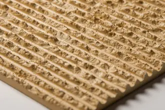 Artstone | Warm beige Libree mineral-based decorative 3D wall panel with a rugged linear travertine-effect texture