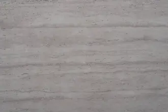 Artstone | Myra Travertine Dark Grey MBT233 dekoratif duvar paneli, koyu gri traverten dokusu ve sade formuyla iç mekânlarda modern, güçlü yüzeyler oluşturur.