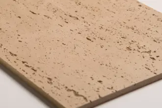 Artstone | Warm beige Sillyon industrial stone-look wall panel with a porous travertine-effect surface