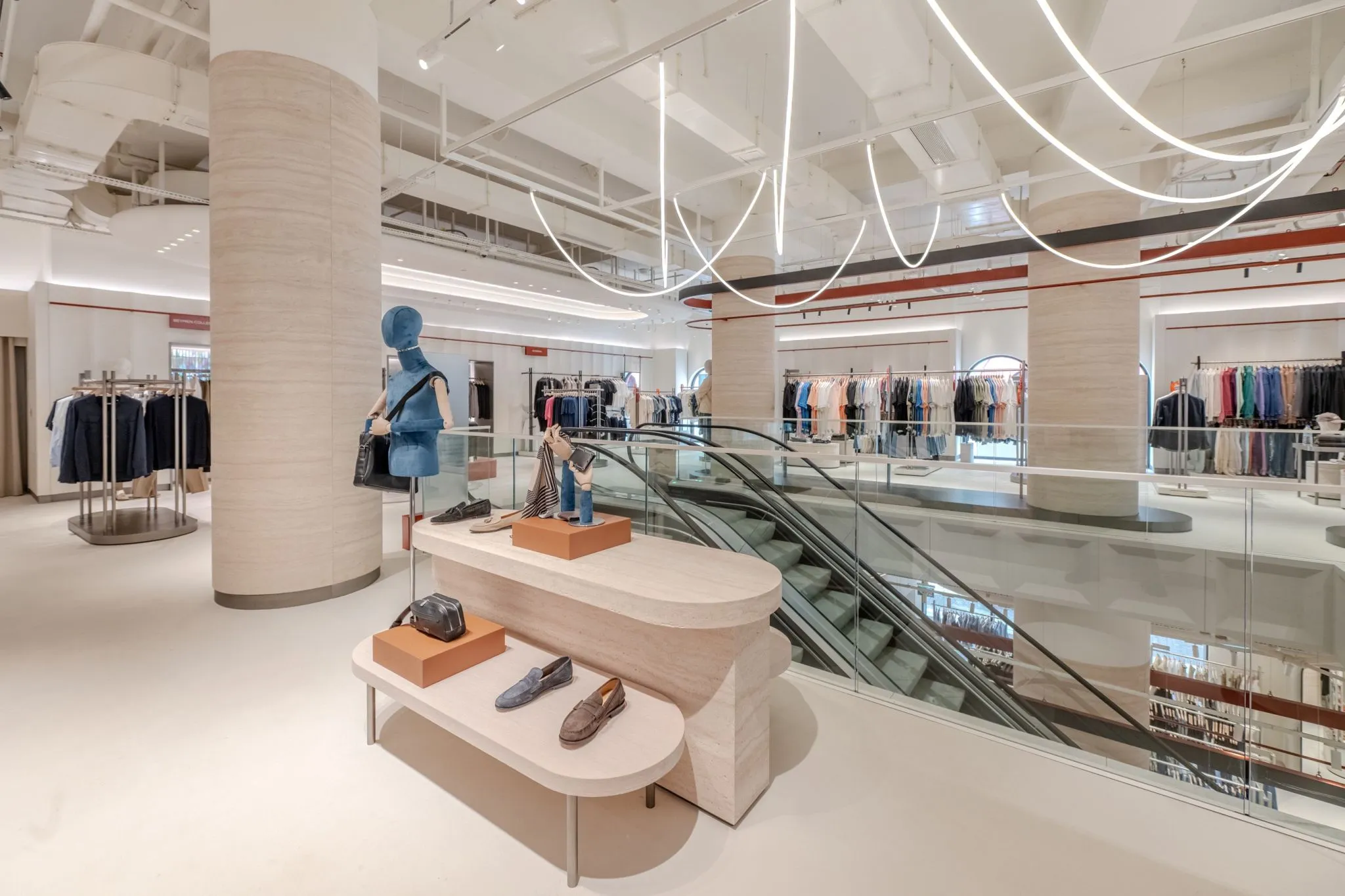 Artstone | Travertine textured columns in Beymen Florentia Village Mall interior