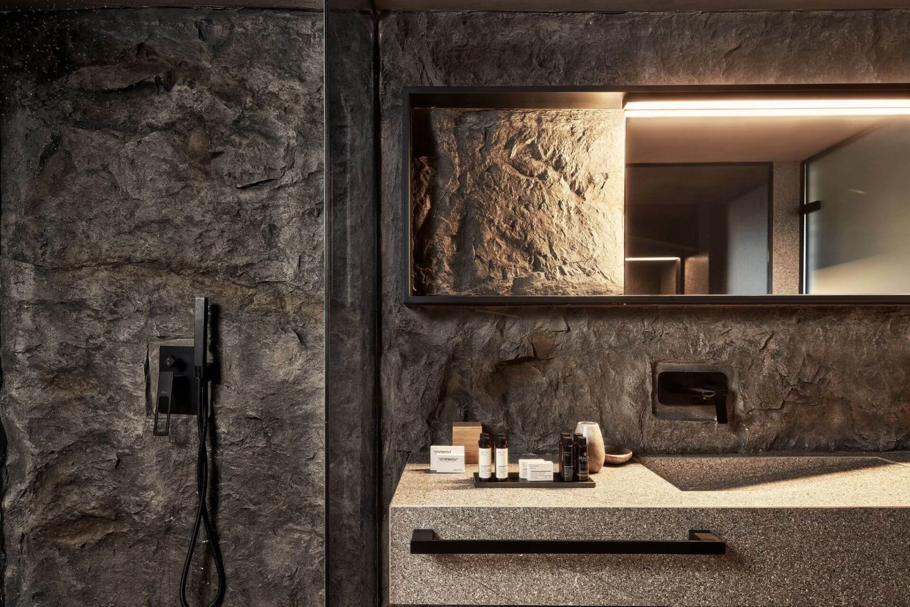 Artstone | Roca Natura Rock wall panel in Nema Design Hotel bathroom